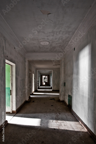 an abandoned corridor, reminiscent of a book flight over a cuckoo's nest.