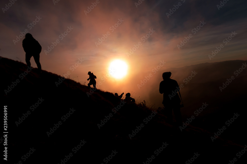 tourist Climbing at the top of the mountain During sunset
tourist Climbing at the top of the mountain During sunset