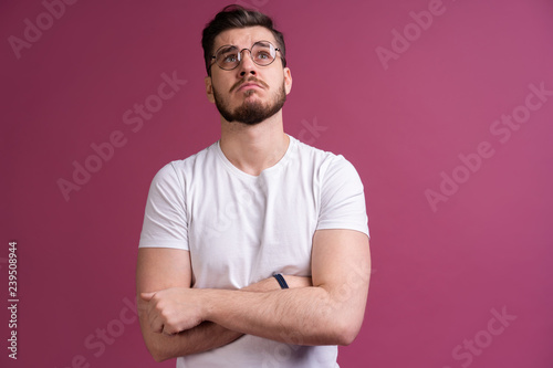 Portrait of happy fashionable handsome man in shirt looking at camera