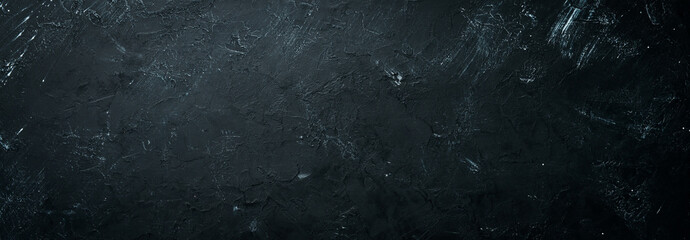Black stone background. Top view. Free copy space.