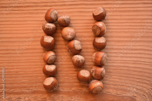 the letter N shaped with hazelnuts