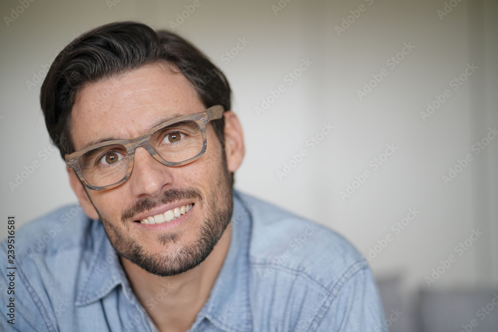 Portrait of casual handsome man wearing designer glasses Portrait of casual handsome man wearing designer glasses