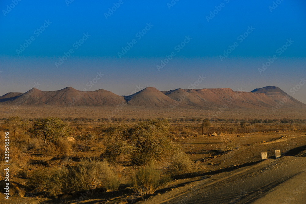 Gravel road near Ai-Ais Richtersveld Transfrontier Park, near Fish River Canyon, one of the largest canyons in the world in Namibia, Africa