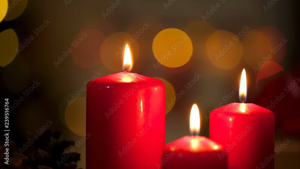 Beautiful candles burning creating calm and relaxing atmosphere, spa salon Beautiful candles burning creating calm and relaxing atmosphere, spa salon