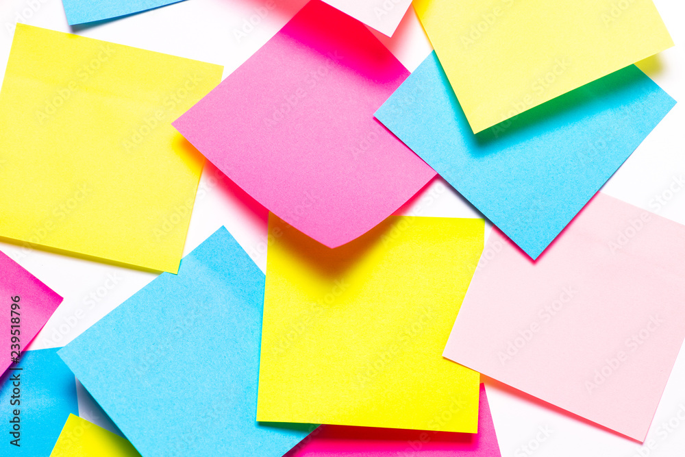 Many colorful sticky notes on white background Many colorful sticky notes on white background