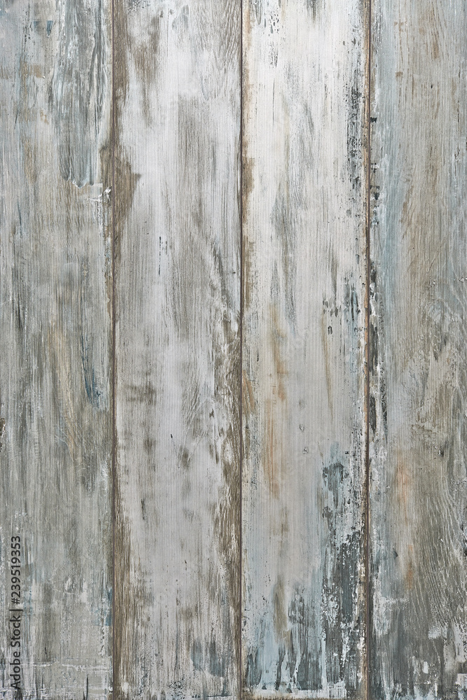 Fototapeta premium Grey grungy textured plank background 