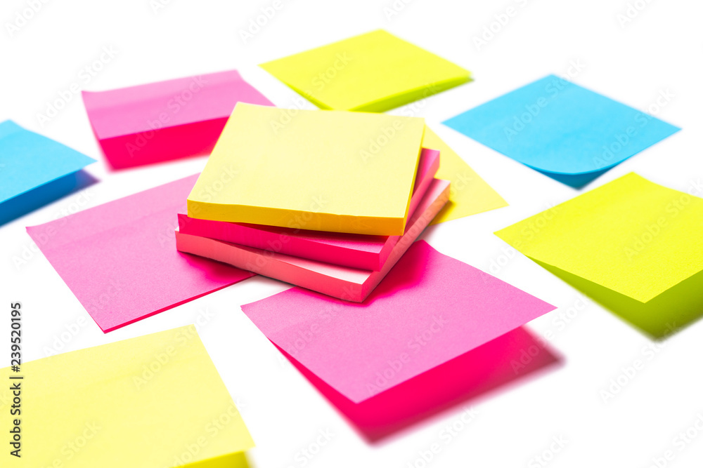 Many colorful sticky notes on white background Many colorful sticky notes on white background