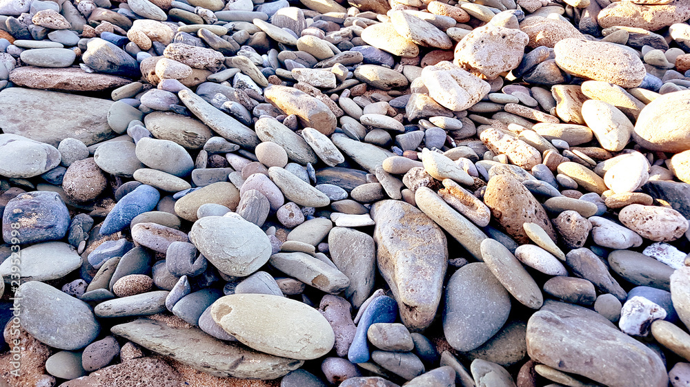 natural pebbles stone, gravel beach texture background. natural pebbles stone, gravel beach texture background.