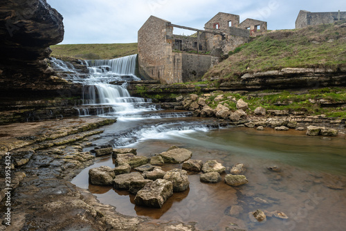 El Bolao Waterfall and a mill in ruins, Cantabria, Spain
