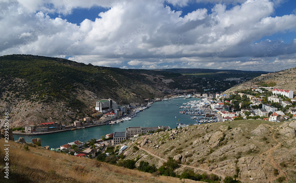 Marine Bay with Ukrainian ships against a background of mountains