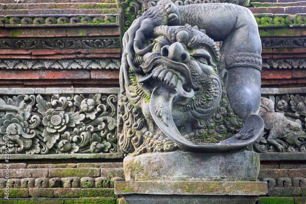 Traditional stone statues depicting demons, gods and Balinese mythological deities in Bali,Indonesia