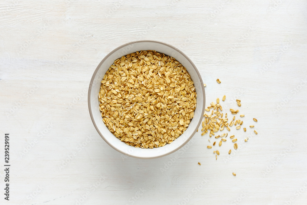 Bowl of dry oatmeal viewed from above Bowl of dry oatmeal viewed from above