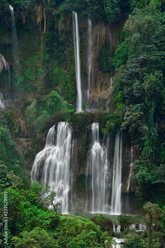 Great waterfall in Thailand. Beautiful waterfall in the green forest. Waterfall in tropical forest at Umpang National park, Tak, Thailand.