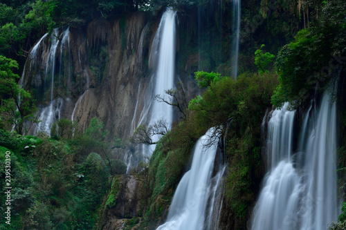 Great waterfall in Thailand. Beautiful waterfall in the green forest. Waterfall in tropical forest at Umpang National park  Tak  Thailand.