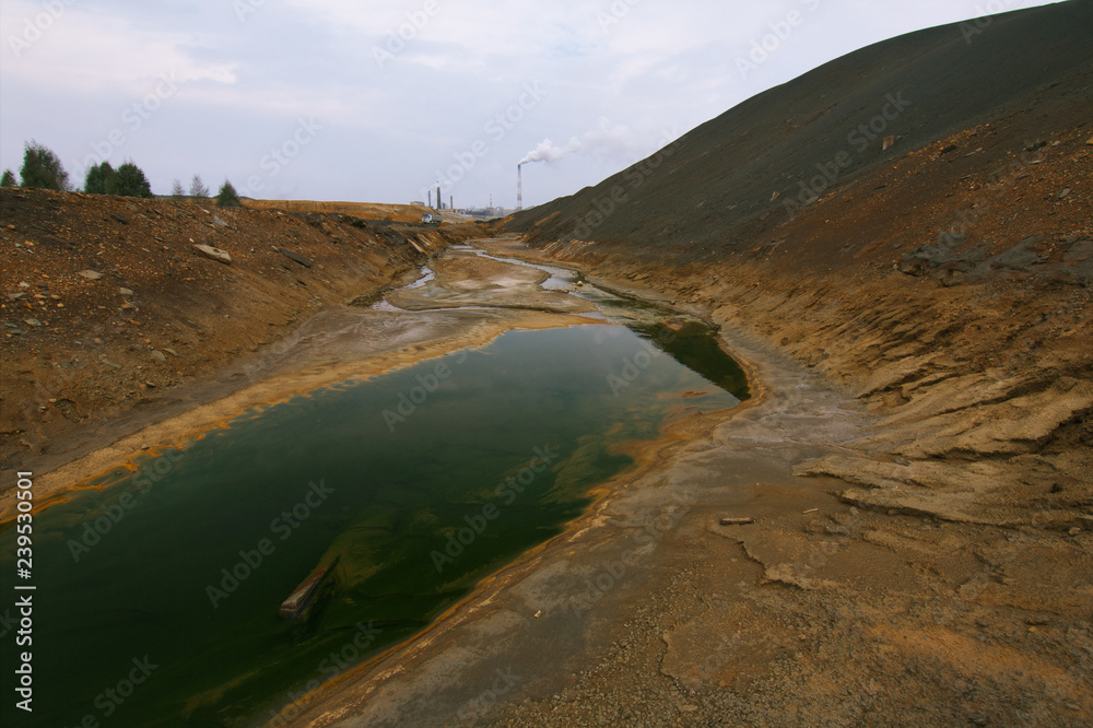Pond contaminated with toxic waste near the copper plant. Karabash.