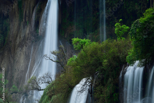 Great waterfall in Thailand. Beautiful waterfall in the green forest. Waterfall in tropical forest at Umpang National park  Tak  Thailand.