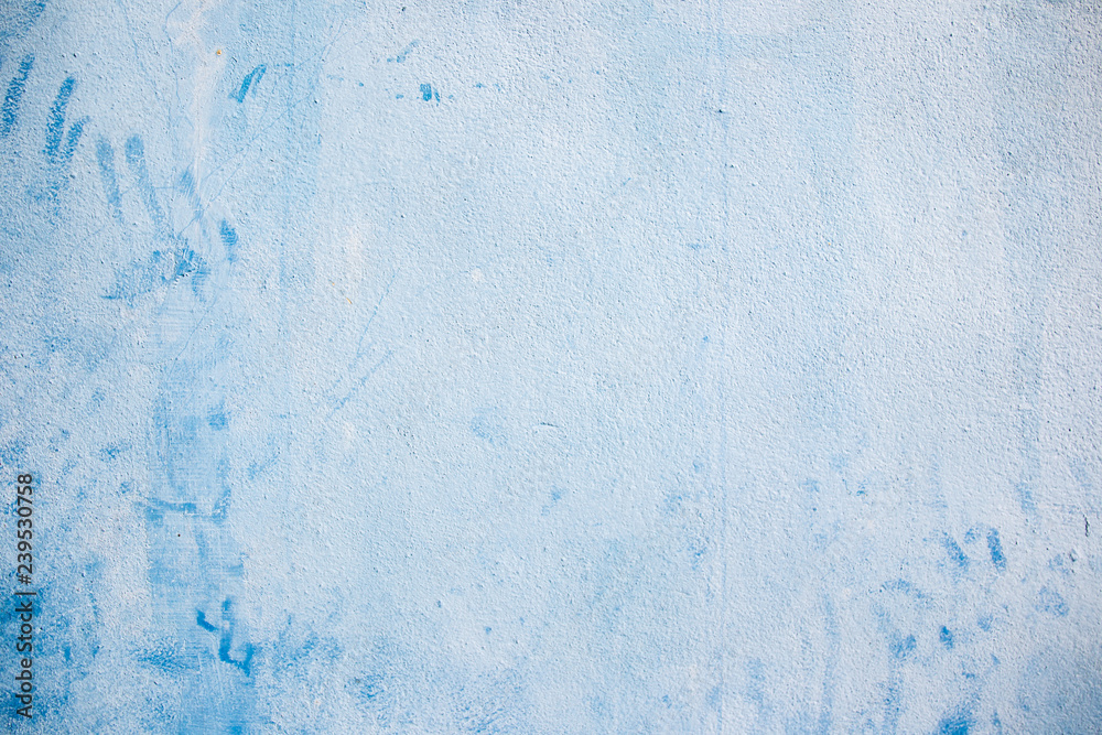 Blue concrete wall background.