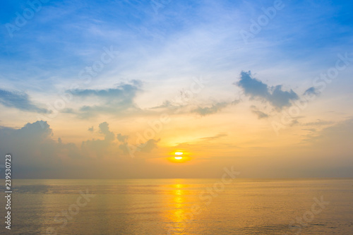 Beautiful sunrise from the sea with beautiful cloud background. © DG PhotoStock