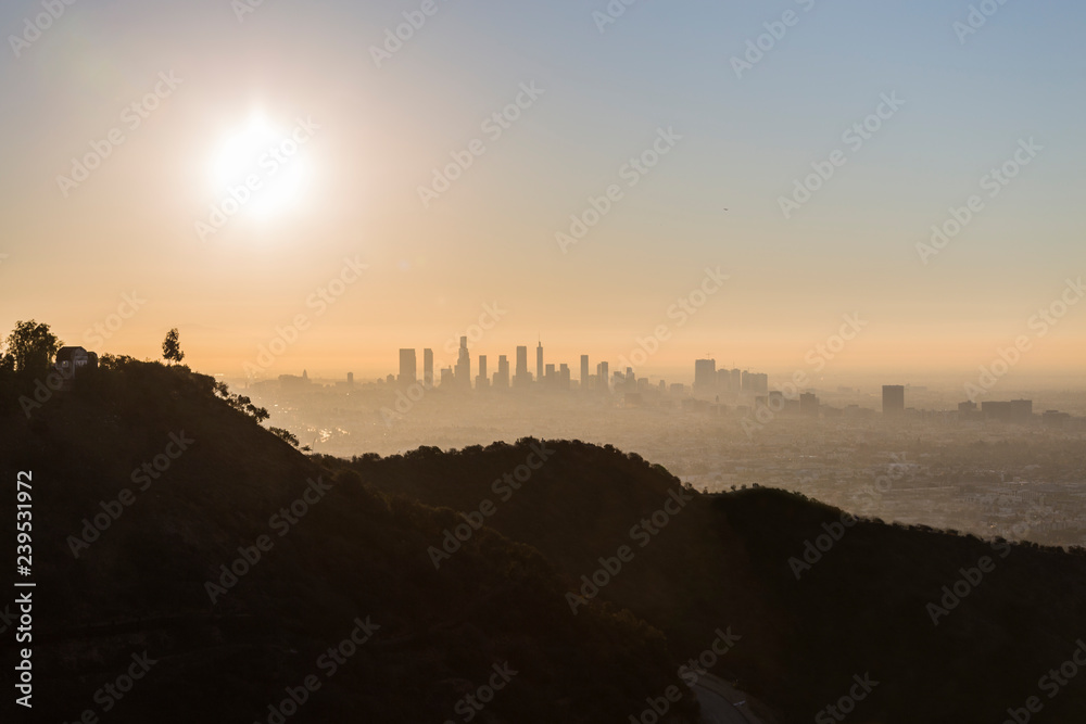 Sunny morning skyline view of downtown Los Angeles from Runyon Park and the Hollywood Hills in Southern California.
