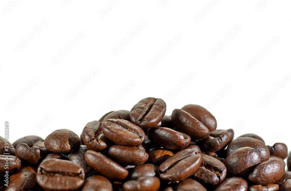 roasted coffee beans heap or pile isolated on white background roasted coffee beans heap or pile isolated on white background