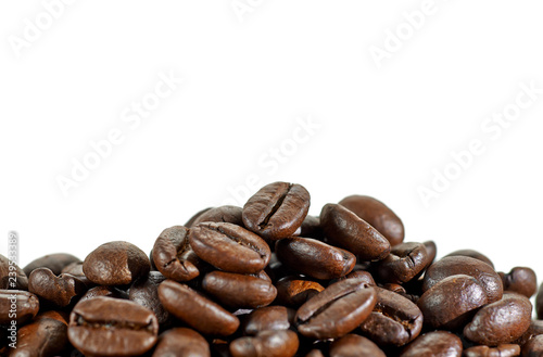 roasted coffee beans heap or pile isolated on white background
