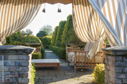 modern gazebo in cottage garden