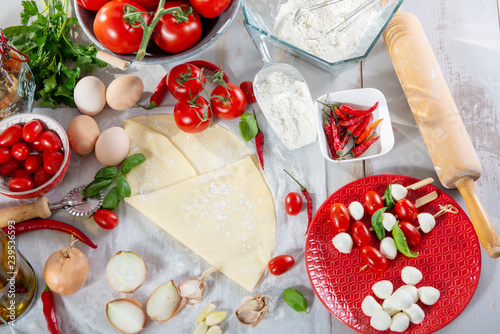 ingredients for preparation of the delicious pizza