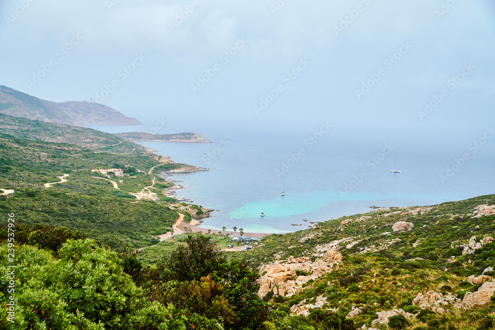 View of a bay on Corsica, Corse during the rain storm