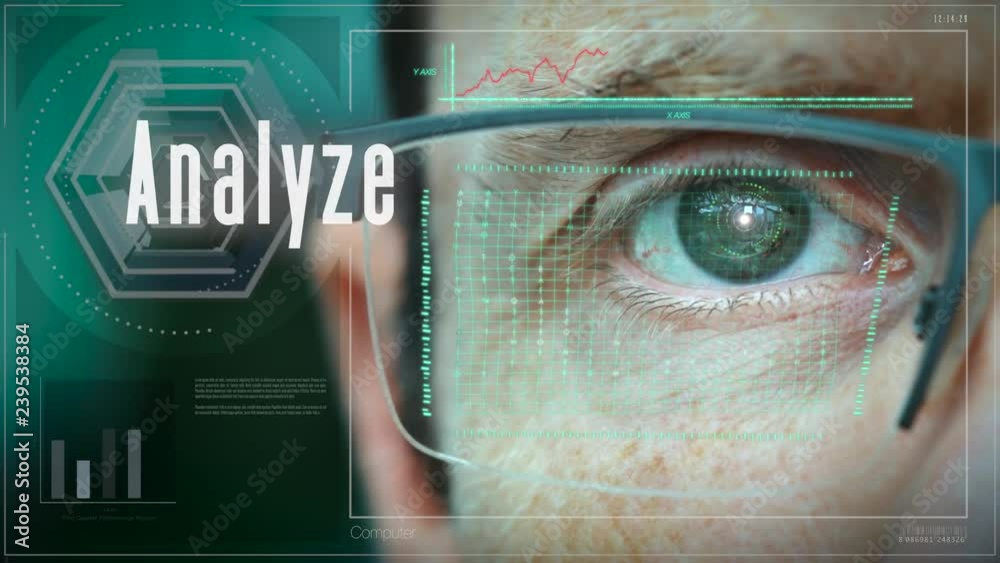 A close up of a businessman eye controlling a futuristic computer system with an Analyze concept.
