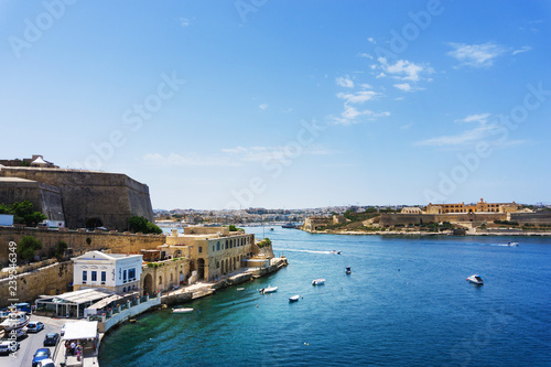Fototapeta Naklejka Na Ścianę i Meble -  VALLETTA, MALTA - June 28, 2017: Typical Seaside port in Valletta in Malta
