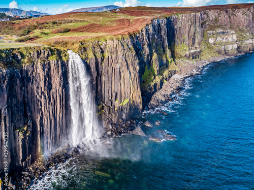Aerial view of the dramatic coastline at the cliffs by Staffin with the famous Kilt Rock waterfall - Isle of Skye - Scotland © Lukassek