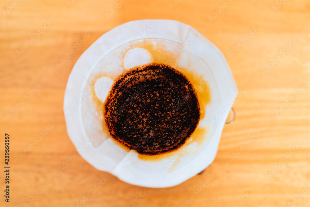 Brewing coffee and coffee grounds in a coffee filter Brewing coffee and coffee grounds in a coffee filter