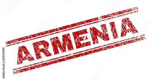 ARMENIA seal print with grunge effect. Red vector rubber print of ARMENIA label with scratched texture. Text label is placed between double parallel lines.