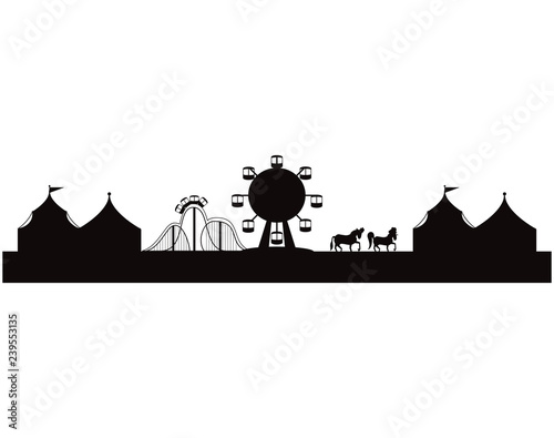 silhouette of amusement park with tents circus