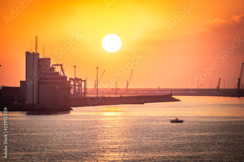 atardecer naranja en el pueblo de getxo photo