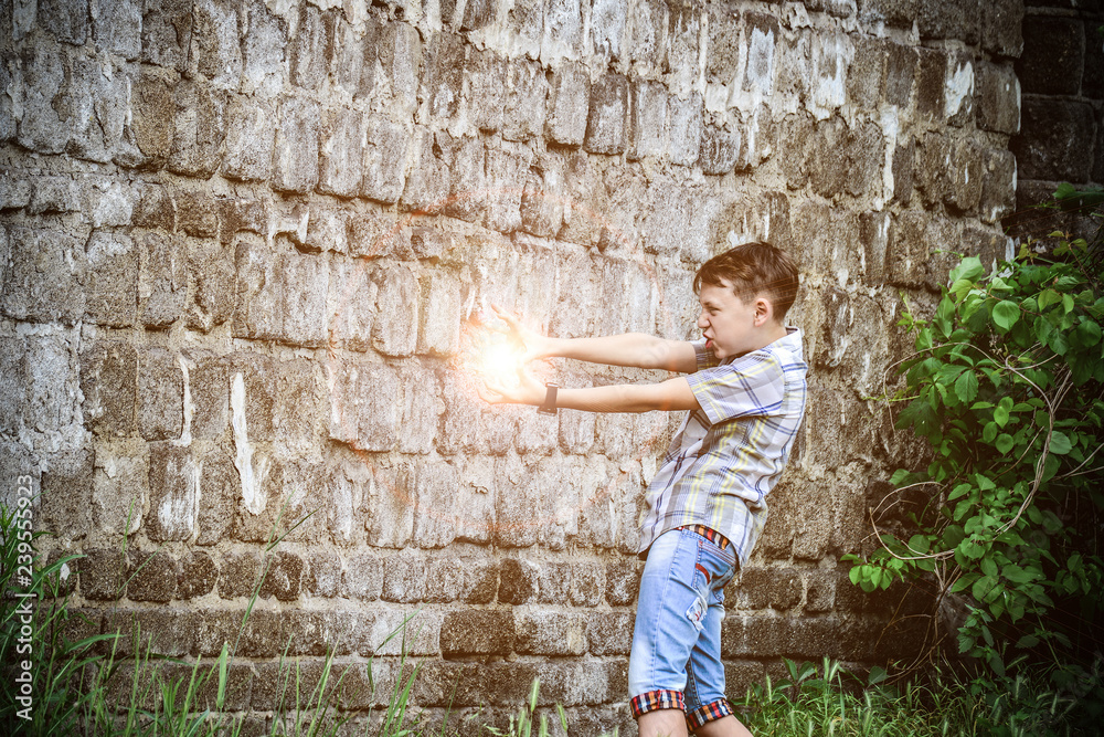 A bright flash of magical flame from the hands of a young wizard, the magic of action in action. A bright flash of magical flame from the hands of a young wizard, the magic of action in action.