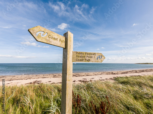 Wooden Sign Post For The Northumberland Coast Path At Boulmer, Northumberland photo
