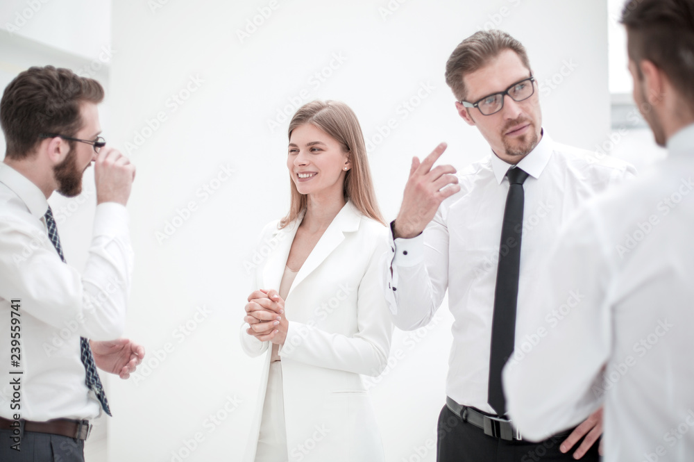 employees of the company discussing a new commercial project employees of the company discussing a new commercial project