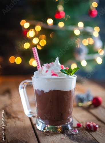 Close-up of Christmas mint hot chocolate on wooden background