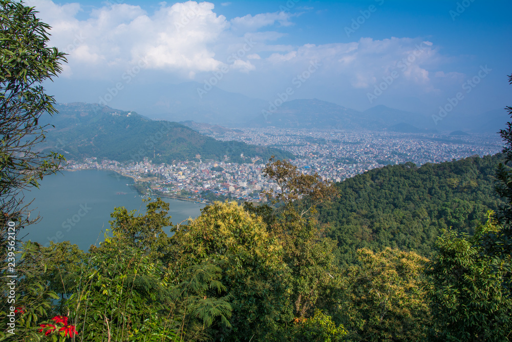 Pokhara town and Phewa Lake as seen on the way up to the World Peace Pagoda. Taken in Nepal, Dec 2018