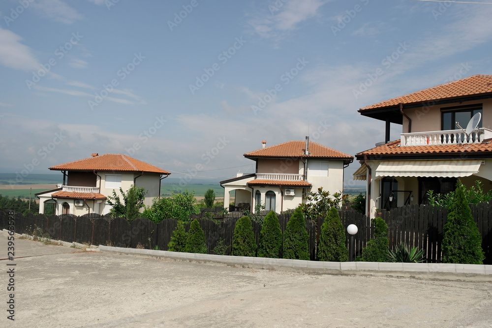 White house with tiled roof in the mountains. Bulgaria White house with tiled roof in the mountains. Bulgaria