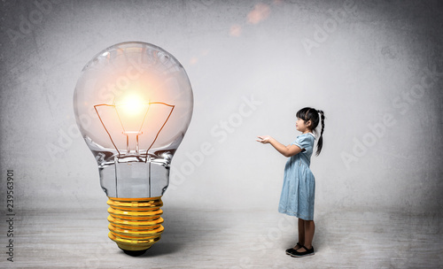 Image of children and light bulbs represent creativity and new ideas.