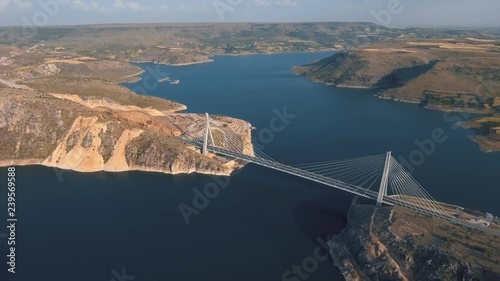 The Nissibi Euphrates Bridge is a cable-stayed bridge completed on May 21, 2015, spanning the Lake Ataturk Dam on the Euphrates River at the provincial border of Adiyaman – Sanliurfa. photo