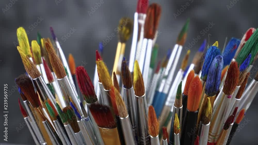 brushes and paints for drawing on the background of the palette