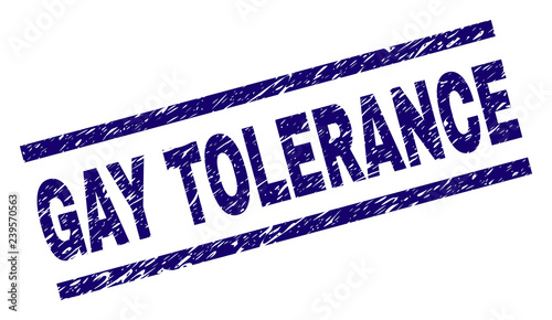 GAY TOLERANCE seal imprint with distress style. Blue vector rubber print of GAY TOLERANCE text with grunge texture. Text label is placed between parallel lines.