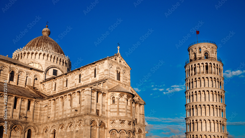 Cathedral and Leaning Tower in sunny day Pisa, Italy.