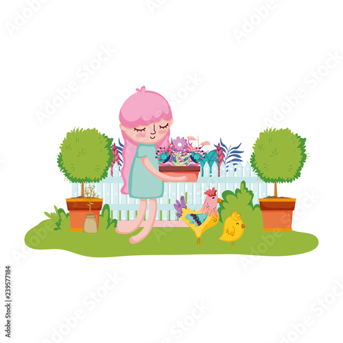 girl lifting houseplant with rooster in the garden