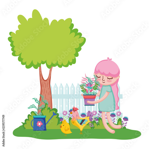 girl lifting houseplant with rooster in the garden