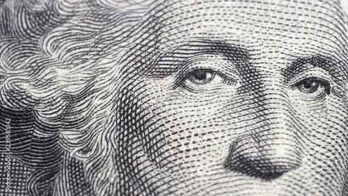 Tracking macro elements on the US one dollar bill. US dollars background.
