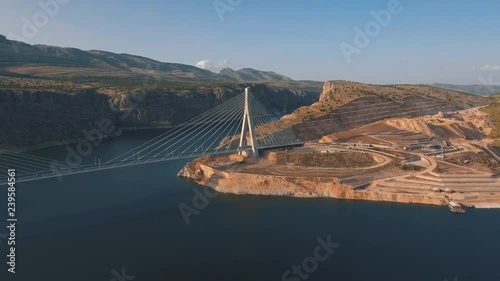 The Nissibi Euphrates Bridge is a cable-stayed bridge completed on May 21, 2015, spanning the Lake Ataturk Dam on the Euphrates River at the provincial border of Adiyaman – Sanliurfa. photo